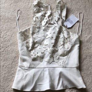 Leather appliqué top